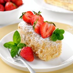 a-slice-of-napoleon-cake-with-strawberries-and-mint-layer-cake-with-cream-closeup-.jpg a-slice-of-napoleon-cake-with-strawberries-and-mint-layer-cake-with-cream-closeup-.jpg
